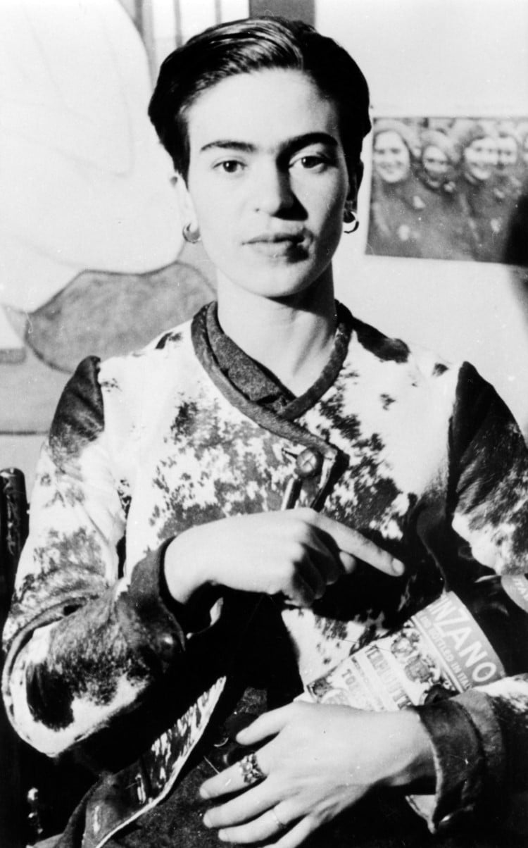 Portrait of Frida Kahlo holding a bottle of Cinzano