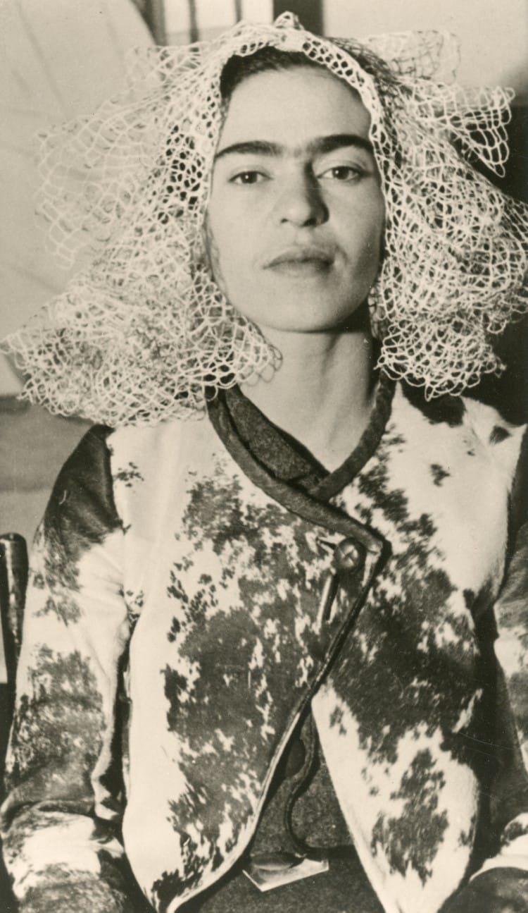 Frida Kahlo with a stuffed animal on her head