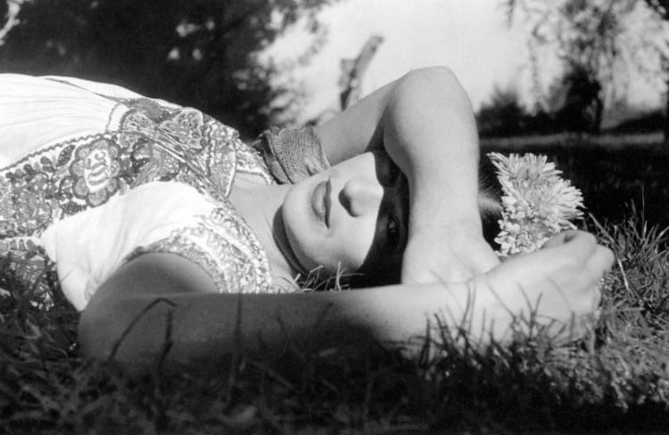 Rosa Covarrubia's portrait of Frida Kahlo lying on the grass